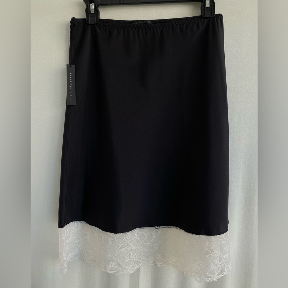 COPY - Black natural silk midi skirt with a lace at the bottom.
